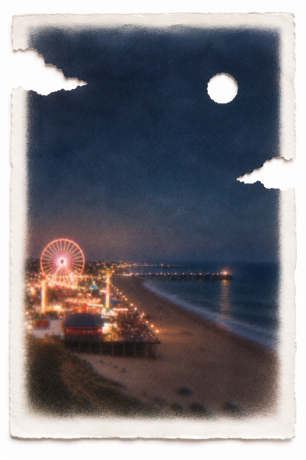 A glowing Ferris wheel and pier at night on torn paper